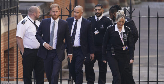 Prince Harry Leaves London Court Fan Disrupts Hearing