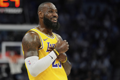 Los Angeles Lakers forward LeBron James reacts during the first half of Gam